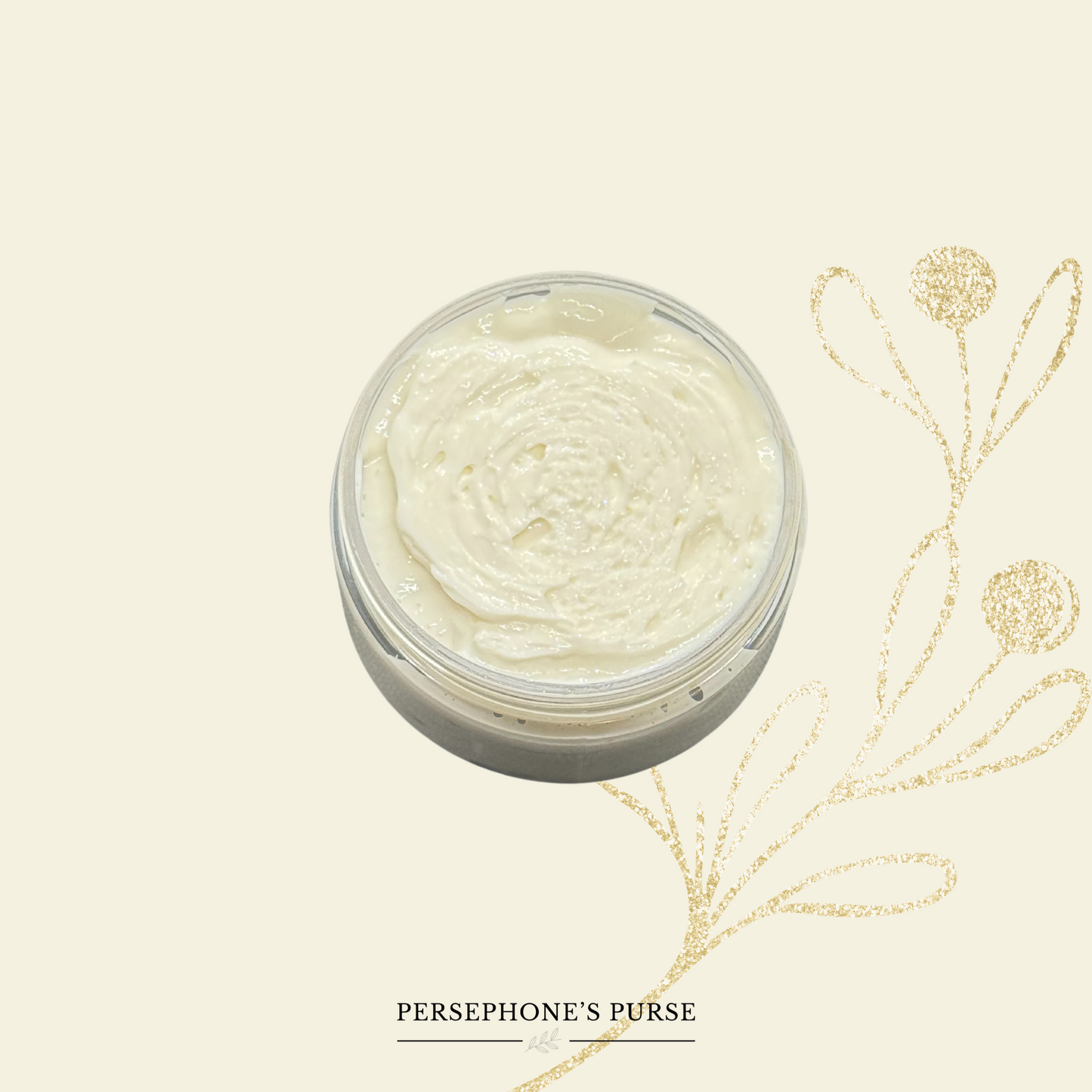 Open jar of Hathor Hair Cream showing its creamy whipped texture.