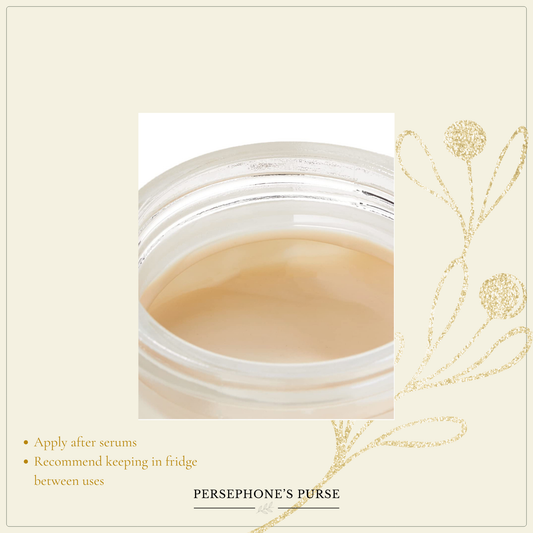 Open jar of Iris Eye Cream showing smooth beige cream texture.